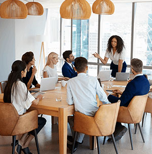 business-meeting colleagues in a modern workplace setting discussing business consulting